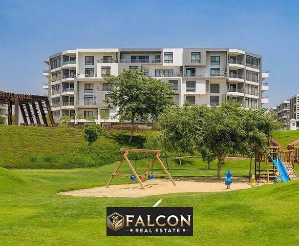 Apartment with installments up to 12 years with a panoramic view of Central Park in Tag City Compound in front of Cairo Airport 0