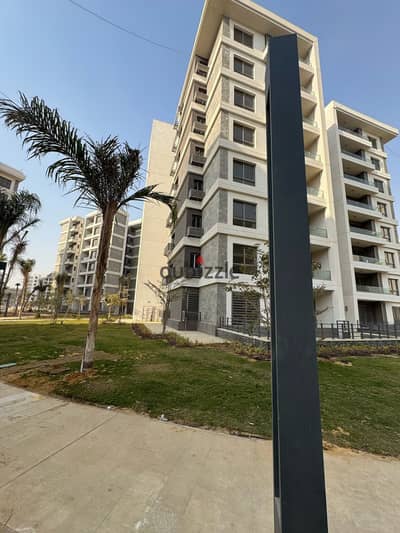 For sale in the first fully Smart City in Egypt, an apartment in City of Light, with an area of 147 sqm, with a wide garden view, north-facing, untouc