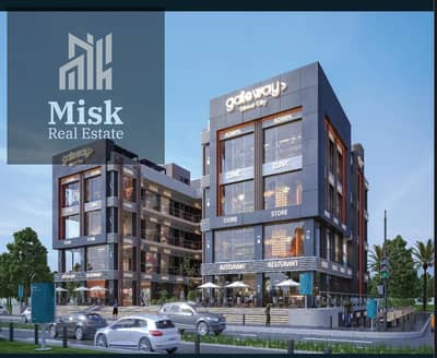 Invest wisely, a commercial store for sale, suitable for all activities, ground floor in GATE Way Mall, a distinguished location on the main axis of O