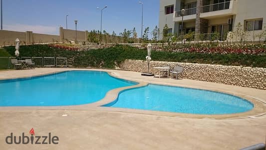 Apartment for sale with swimming pool view, fully finished, in The Address Compound, Sheikh Zayed