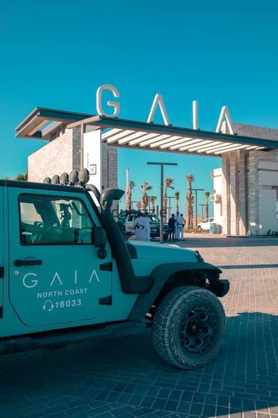 Steps from the sea for sale, a 3-bedroom chalet with a sea view, overlooking the swimming pool, in Gaia, North Coast, Ras El Hekma