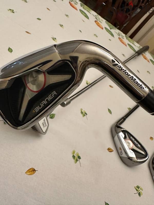 Give away Taylor Made Golf Clubs 9