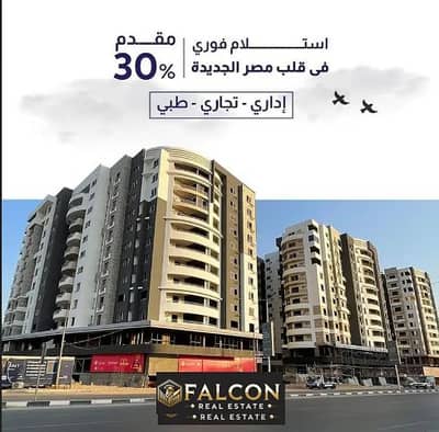 For sale Shop Ready To Move in New Nozha, directly on Joseph Tito Axis, in front of the Cairo Airport, in Rich Point Mall