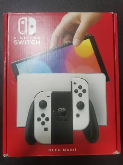 Nintendo Switch Oled - like new + 25 games