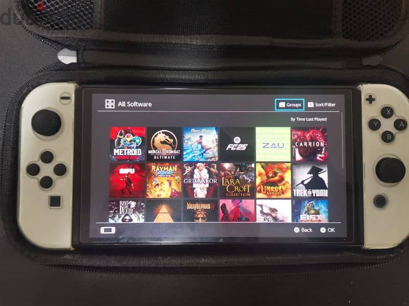 Nintendo Switch Oled - like new + 25 games 1