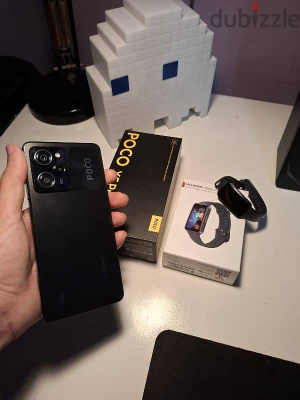 xiaomi poco x5 pro 5G 256 condition as new with huawei band 8 as new 1