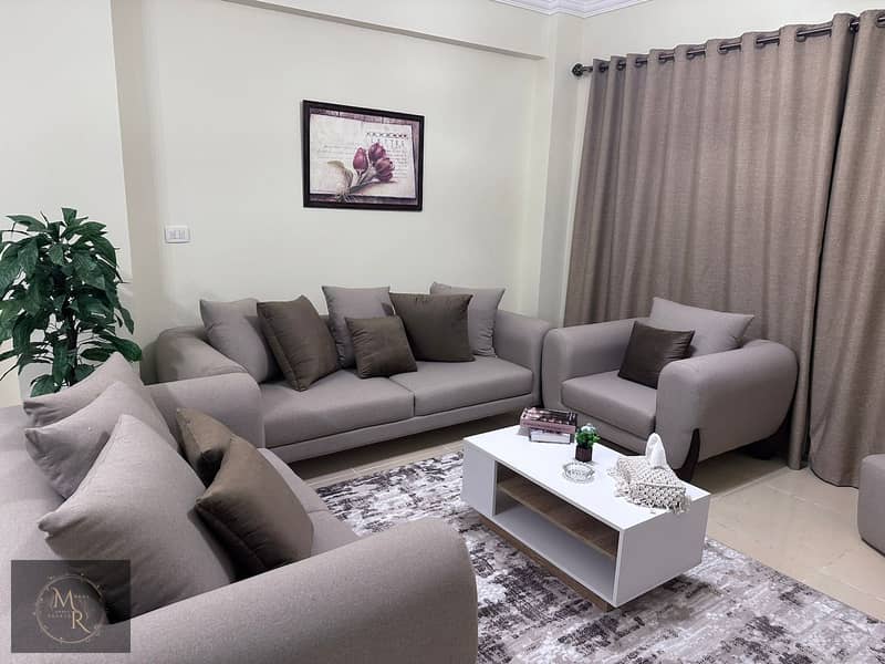 For rent, furnished, Wasal Compound, first-class apartment, 3 bedrooms, modern furniture, excellent location, next to Suez Road and the Middle Ring Ro 0