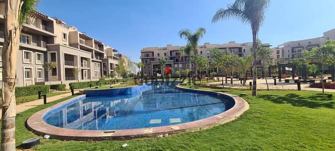 apartment FOR SALE IN October plaza sodic compound  Swimming pool view