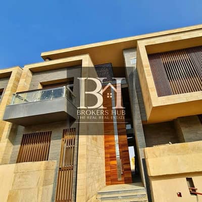 Town House villa Installment prime location for sale in Taj city New Cairo