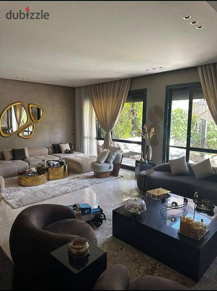 Apartment 172 sqm + garden 63 sqm, finished, for sale in installments in the Fifth Settlement, in the 90 Avenue Compound, next to the American Univers 0