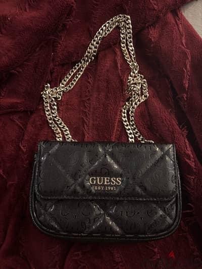 The GUESS Dilla Micro Mini Crossbody in black