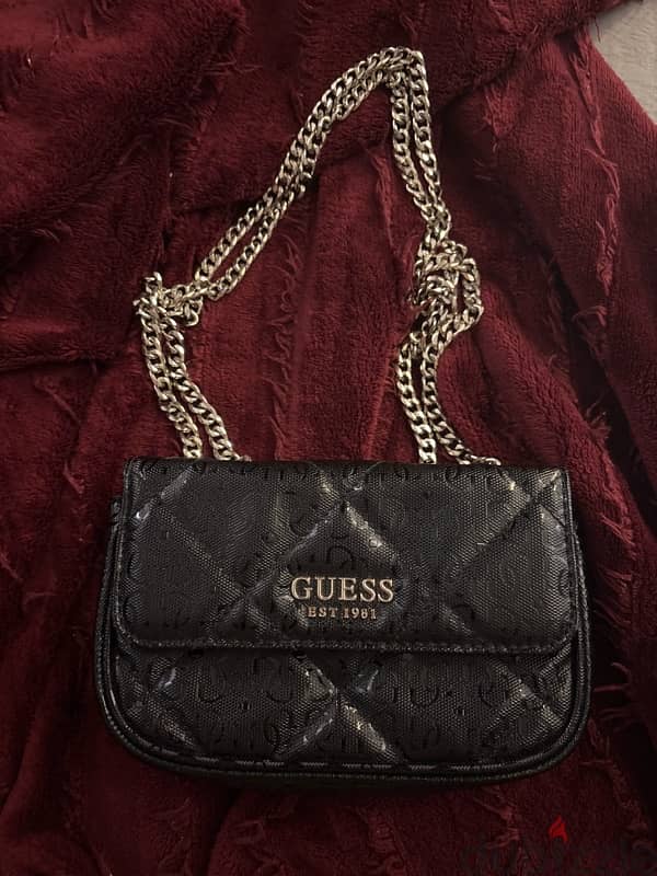 The GUESS Dilla Micro Mini Crossbody in black 0