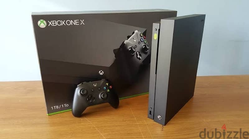 Xbox One X 1 T. B slightly Used 0