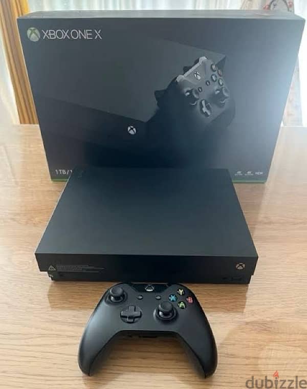 Xbox One X 1 T. B slightly Used 2