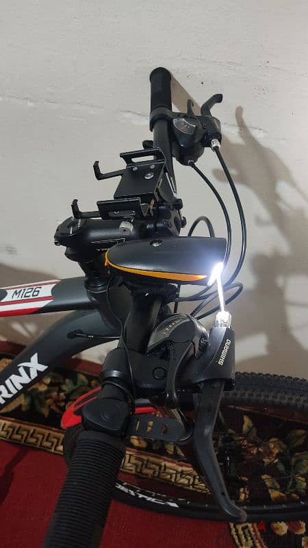 Trinx M126 Bro 9