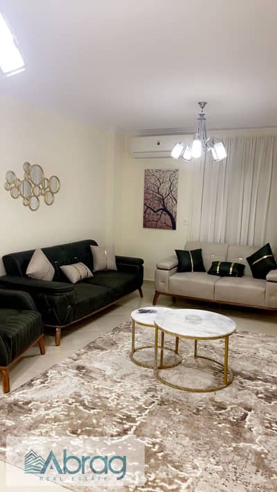 For rent, a fully furnished, air-conditioned 3-bedroom apartment in Dar Misr 12 Compound, Sheikh Zayed