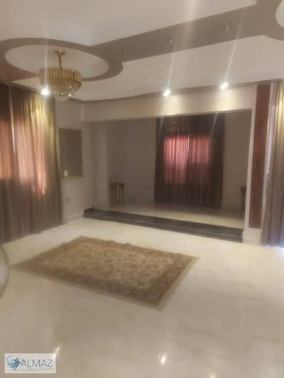 A garden view apartment for rent with kitchen and air conditioning in Narges 3 Villas in the Fifth Settlement, 200 square meters.