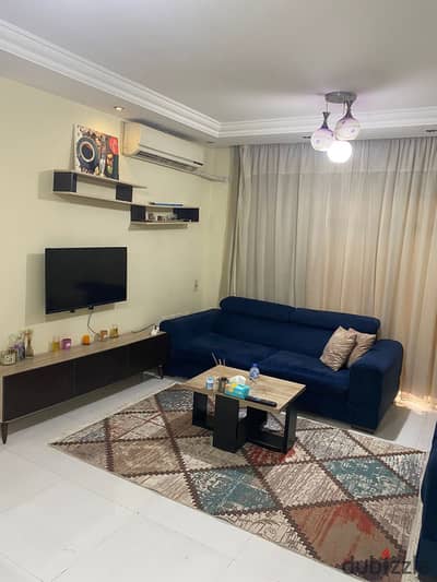 For rent furnished in Madinaty, an 82-square-meter apartment in B7, fully air-conditioned, great location and price, wide steps to services and South