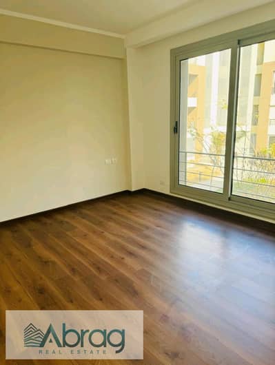 For rent, an apartment of 133 square meters, two rooms, a kitchen, and air conditioning, first residence in Palm Parks Compound, 6th of October