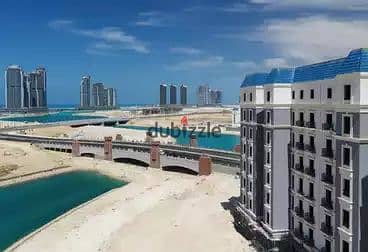 apartment for sale ( open view of the beach towers ) at Latin District New Alamein with installments up to 12 years