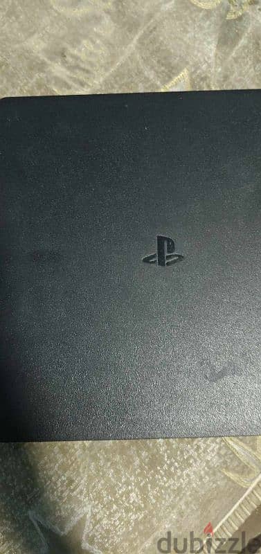 ps4  slim بدراعين وباقة العاب 7