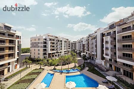 The last 3-bedroom apartment, 145m, for sale with an open pool view next to AUC - delivery soon - in The Icon, in installments