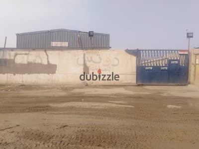 A fenced plot of land for rent, 3,500 m², on the Ismailia Desert Road, near Mostakbal City.