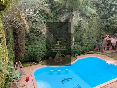 Villa for sale, model K, luxurious finishes, independent swimming pool, prime location in Rehab 1, First Settlement, Rehab City, New Cairo