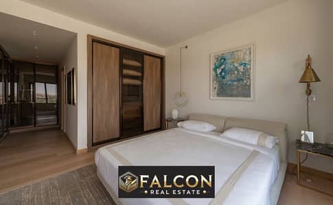 Apartment for sale at a bargain price with a 40% discount, fully finished with air conditioning, under the management of Marriott Hotels in Heliopolis