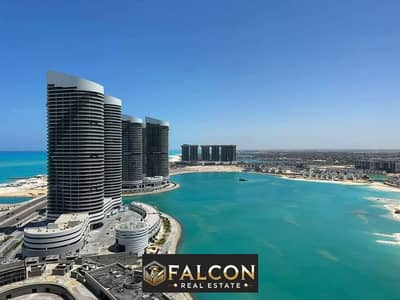 A fully finished apartment with air conditioners in New Alamein, double view of the sea and the lagoon, near the new Latin neighborhood, with a 5% dow