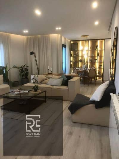 Apartment for sale  on El Thawra Street with hotel finishing, distinctive interior layout, and an open view of the swimming pools