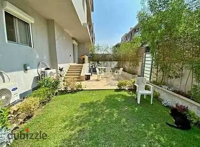 Apartment for sale with garden 130m in Taj City First Settlement in front of cairo airport