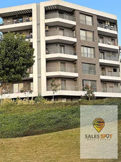 For sale, an apartment of 117 square meters (with a down payment of 460 thousand) in the first compound, in front of the airport, Taj City Compound