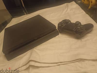 playstation 4 slim (3 games and a controller)