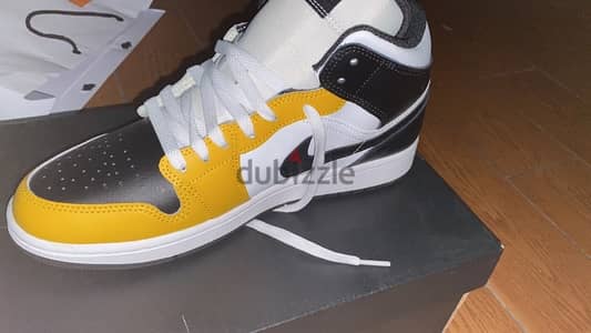 nike air jordan 1 yellow mid