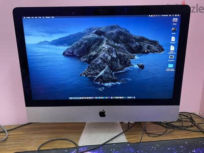 مع العلبه iMac (21.5-inch, Late 2013)