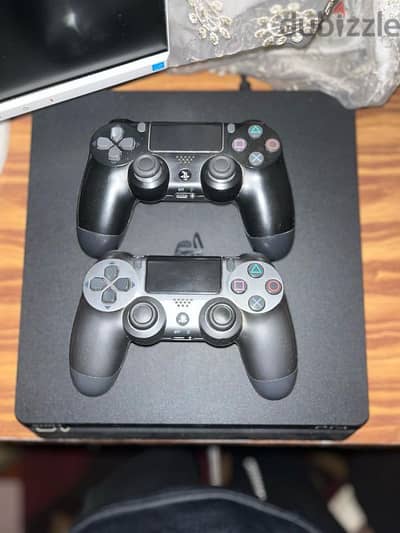 playstation 4 slim and a monitor