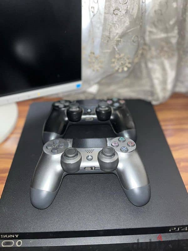 playstation 4 slim and a monitor 3