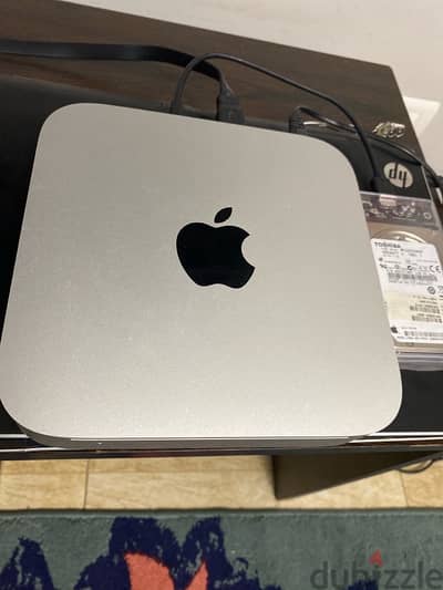 ابل ماك ميني ٢٠١٠.   Apple Mac mini  مع نسخة high sierra