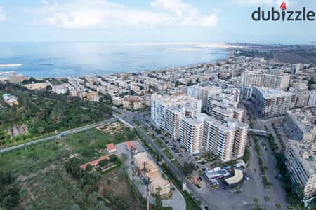 Apartment for sale, 116 m², Montazah - Compound, opposite Montazah Gardens (Down payment: EGP 700,000)