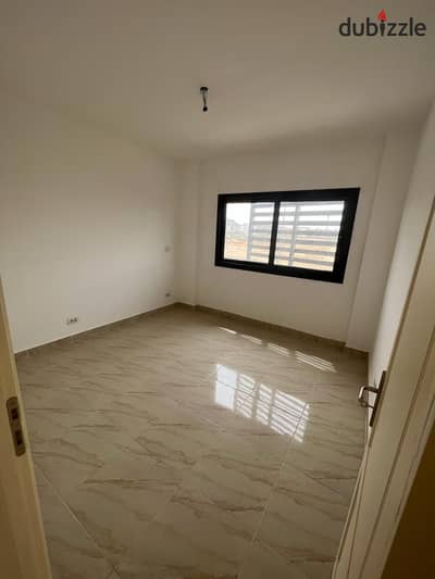 For rent in Madinaty, a new law apartment of 100 square meters in B15, the first residential area in Bahri, steps away from services, in a distinguish