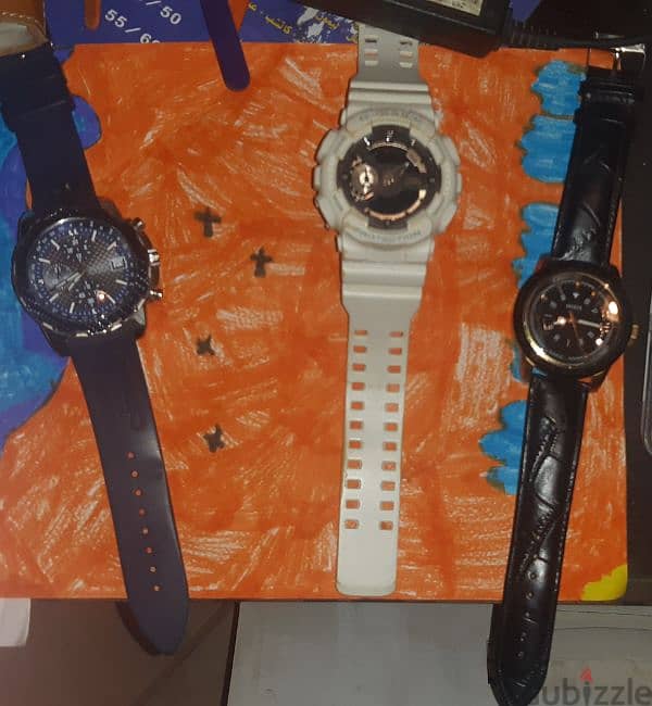 white Gshock Casio, black Guess steel classic, blue Guess 0