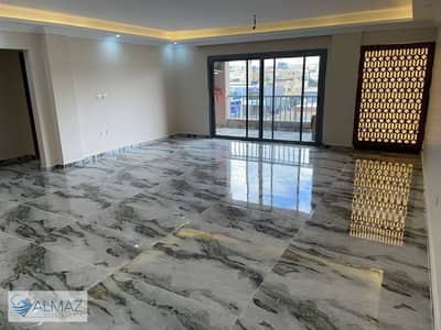 Apartment for rent in Al Masrawiya Compound with elevator in the Fifth Settlement on the main 90th Street