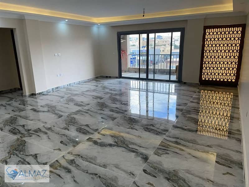 Apartment for rent in Al Masrawiya Compound with elevator in the Fifth Settlement on the main 90th Street 0