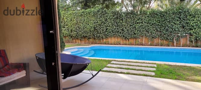 semi furnished villa with pool for rent in Mivida Compound New Cairo