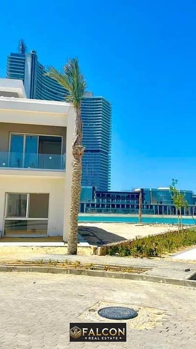 Receive months directly in front of El Alamein Towers, a fully finished villa (3 floors) for sale in installments in Mazarine El Alamein New North