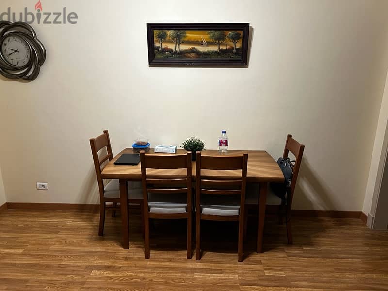 Dining table with 4 chairs used for one week 0