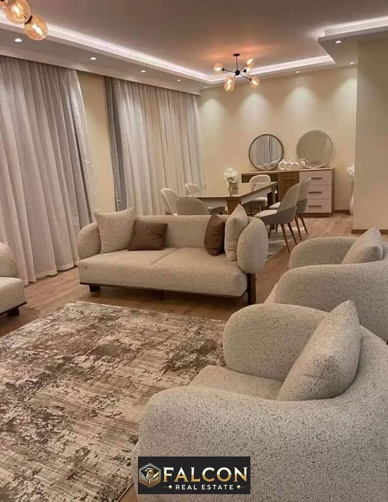 Luxury apartment for sale with a 40% cash discount, fully finished with air conditioning, near Cairo Airport and next to City Center Almaza 0