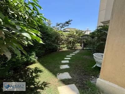 Furnished ground floor apartment with a garden for rent in Mivida Compound in the Fifth Settlement