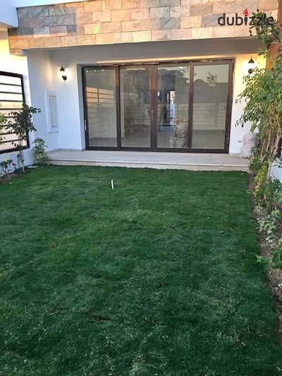 Ground floor apartment for sale with a private garden in Sarai Compound    Walled in Madinaty and near El Shorouk